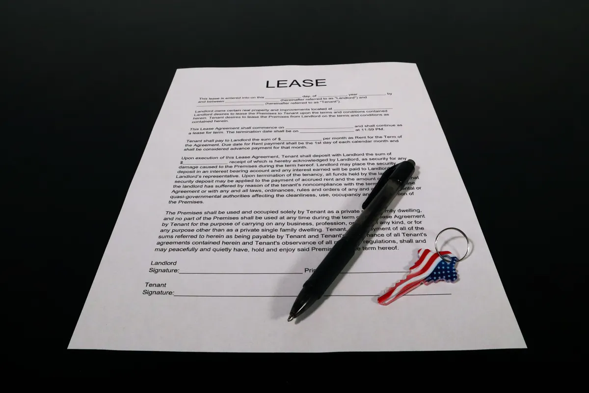 Signing a lease with an apartment pet policy template attached as an addendum