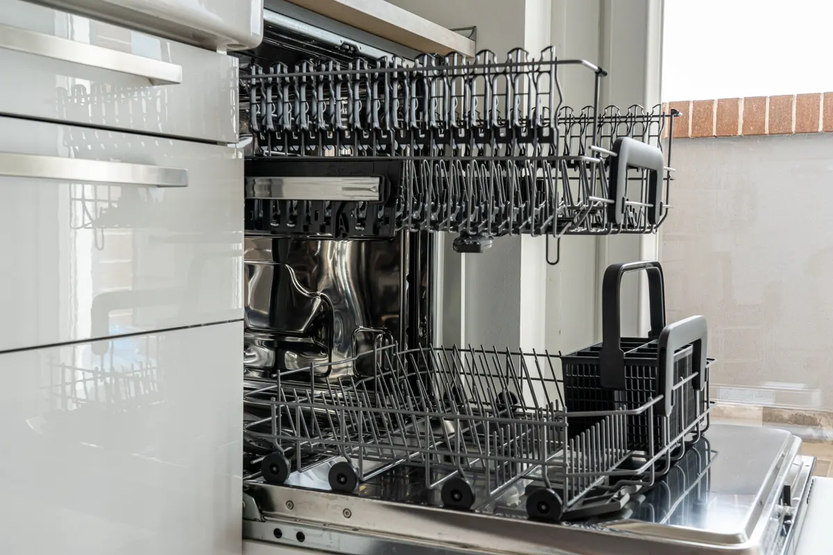 Open dishwasher rack, where dog bowls in the dishwasher belong