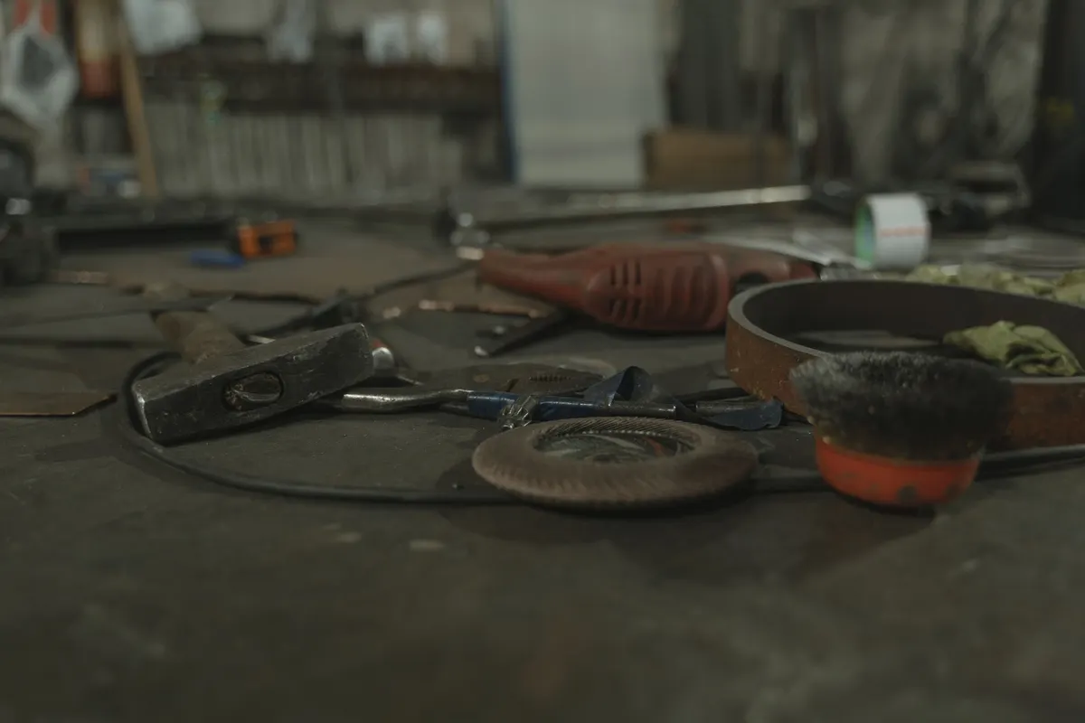 Hand tools on a workshop bench, the way a hoof trimmer gets judged here
